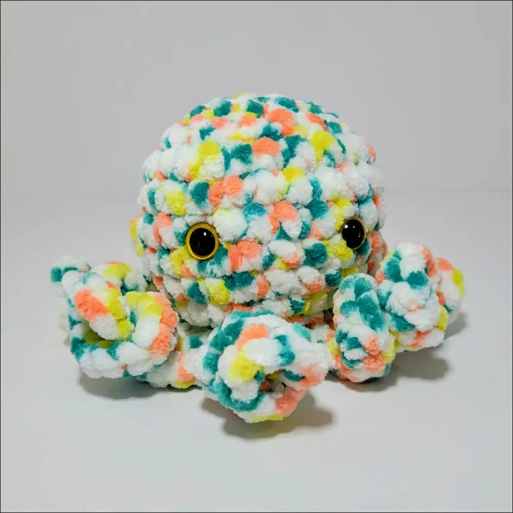 Colorful plush octopus toy made of soft yarn, perfect for snuggles and cuddles