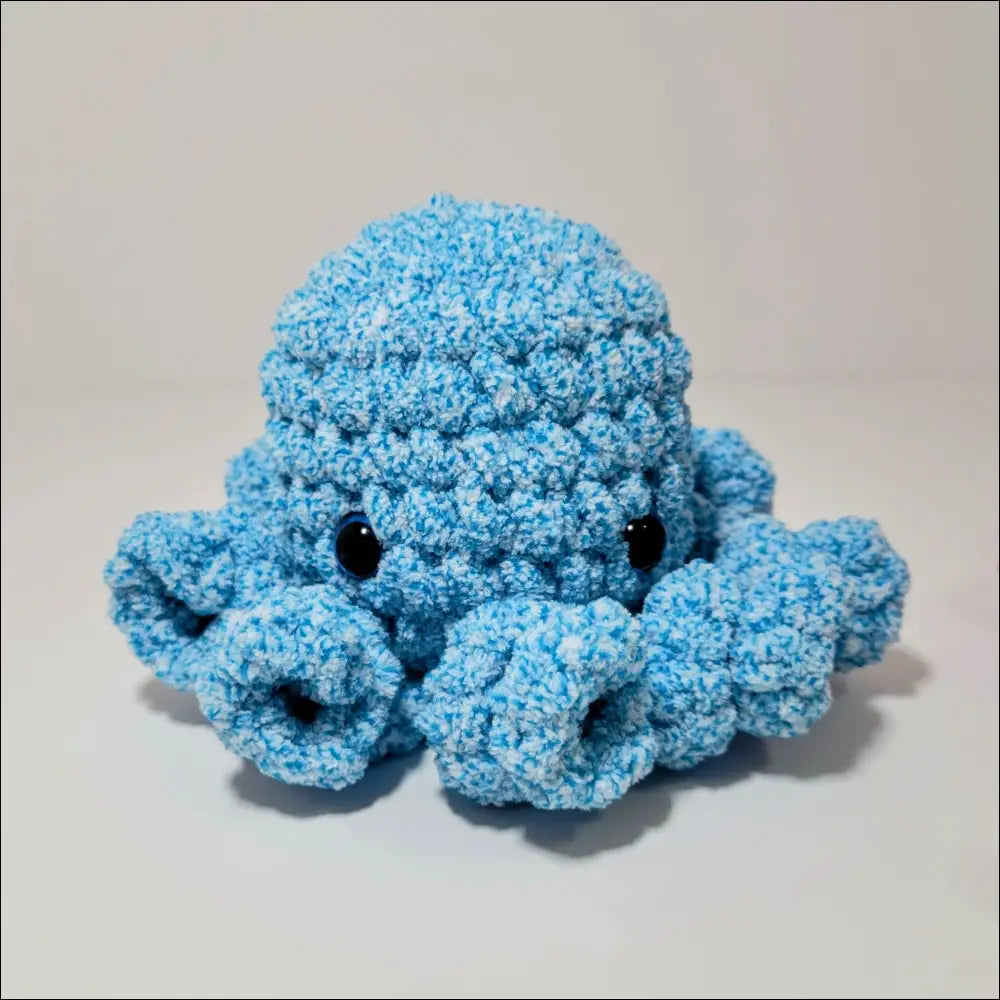 Cute blue octopus plush toy with soft curled tentacles perfect for snuggles
