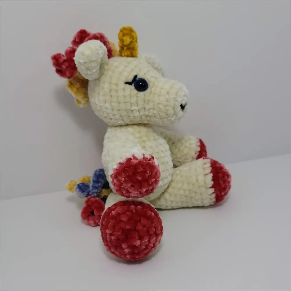 Soft Crochet Unicorn Plush with a cute flower, perfect for checkout and unicorn lovers