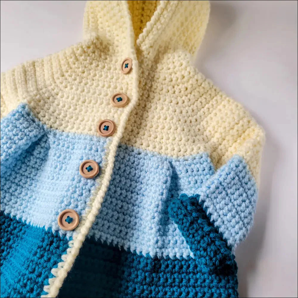 Crocheted baby cardigan in blue ombre, perfect babydoll sweater for 3-6 months