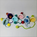 Colorful crocheted toy rattles for Bilbocatch Handheld Game fun and teething joy