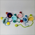 Colorful crocheted toy rattles for Bilbocatch Handheld Game fun and teething joy