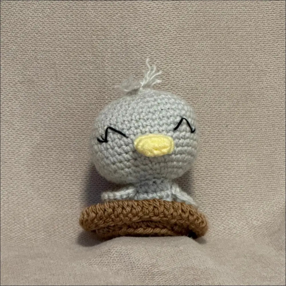 Bird-in-a-nest plush
