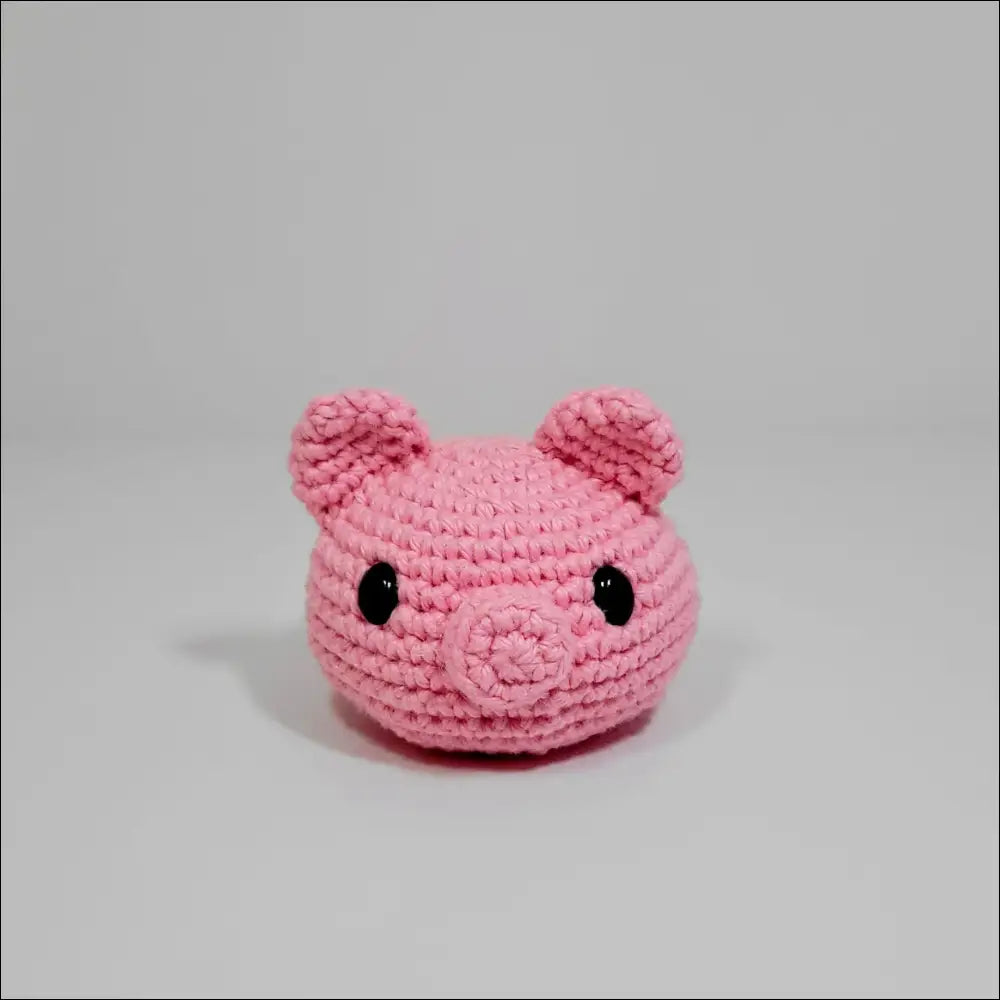 Cute pink Crochet Pig toy with black eyes from Blobimals for fun playtime joy