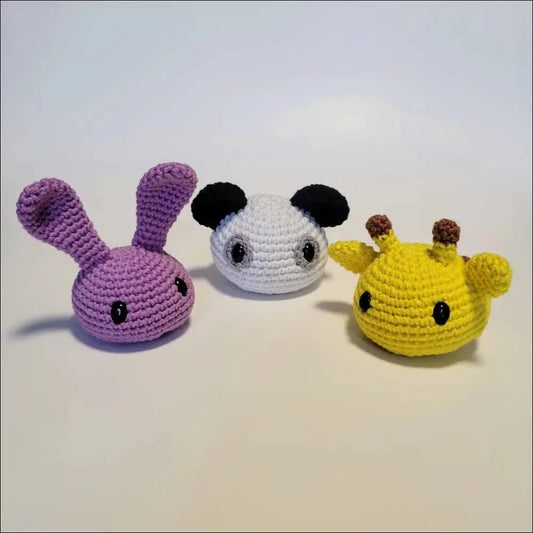 Three cute blobimals in purple, white, and yellow: Bunny, Panda, and Giraffe toys