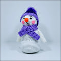 Cheerful Crochet Snowman wearing a purple scarf for a festive touch in decor