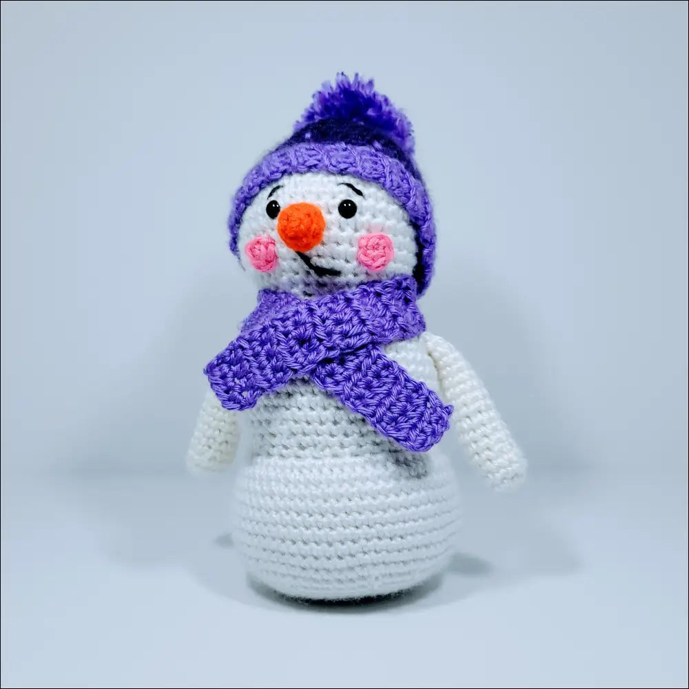 Cheerful Crochet Snowman wearing a purple scarf for a festive touch in decor