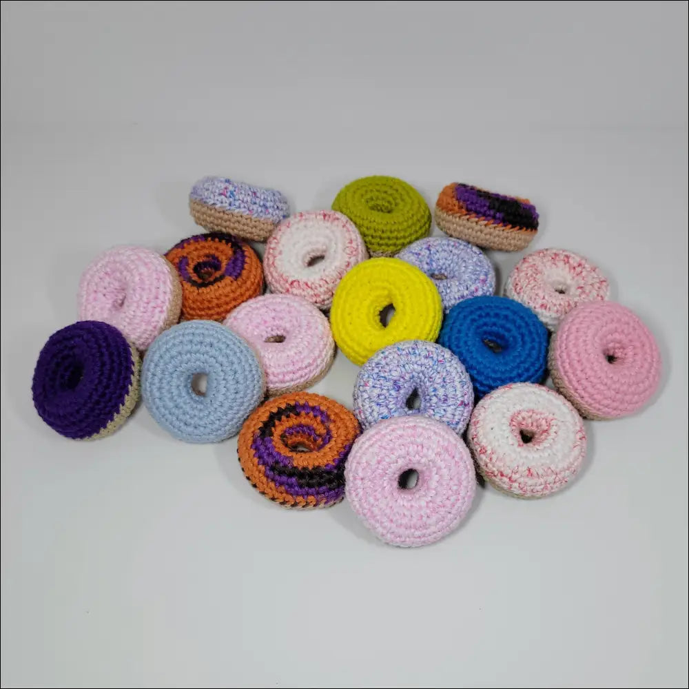 Handmade Crochet Donuts in light blue and red white, perfect for your decor!