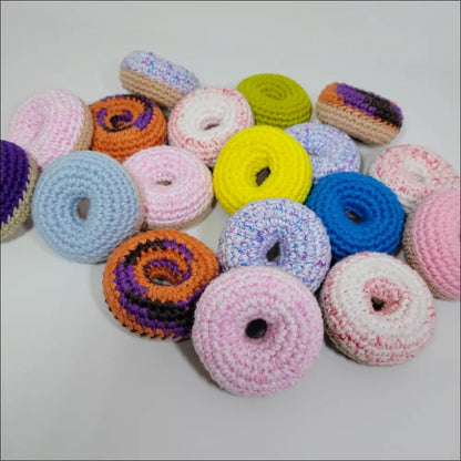 A cute pile of Handmade Crochet Donuts in Light Blue and Red White colors