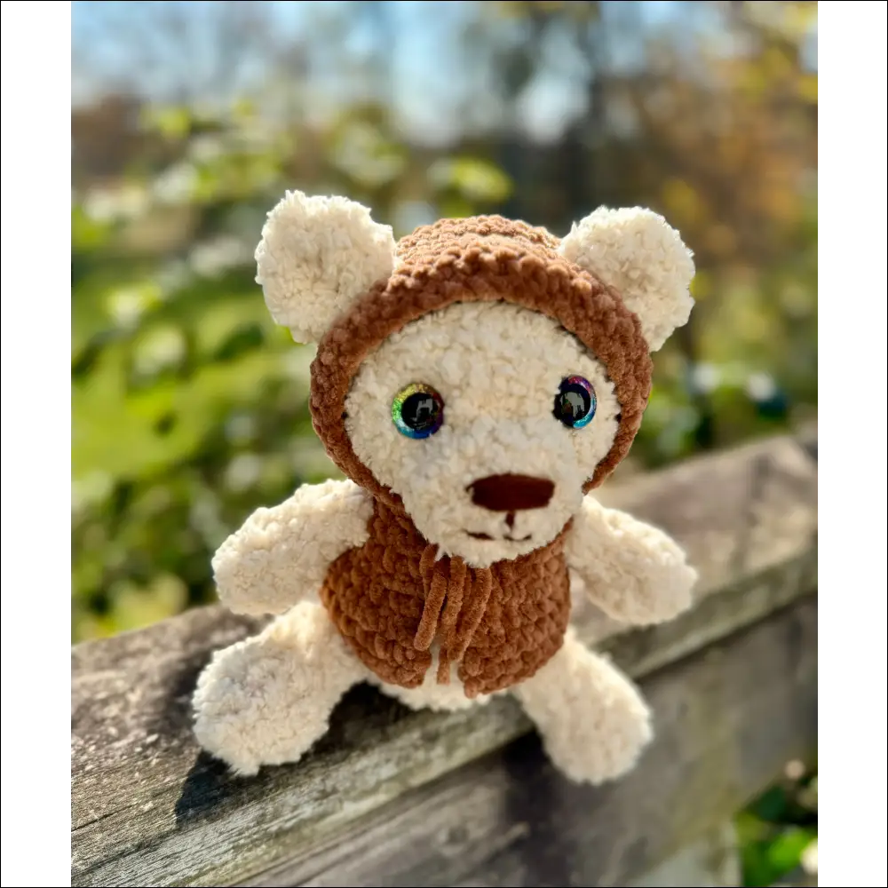 Fluffy Bear in a cozy brown knitted hood, perfect for cuddles and playtime fun