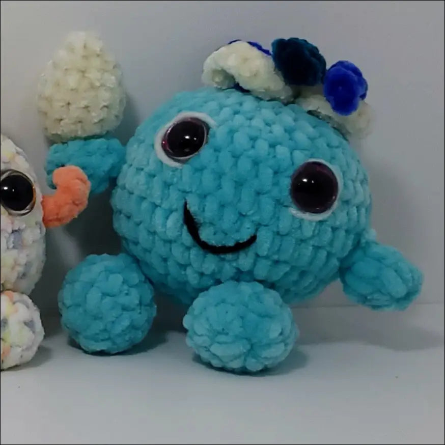Two adorable forest sprites plush toys with a cute water drop design, side by side