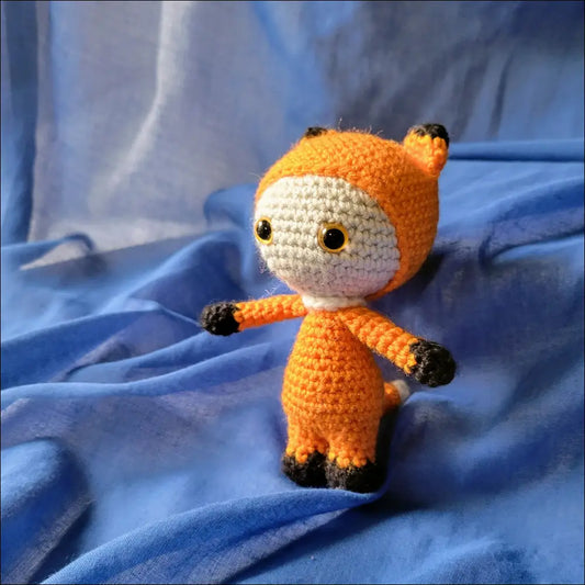 Crocheted fox pal toy perfect for adventures and playtime fun with a cute round head