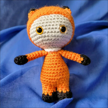 Adorable crocheted fox pal doll with big yellow eyes ready for adventures and playtime fun