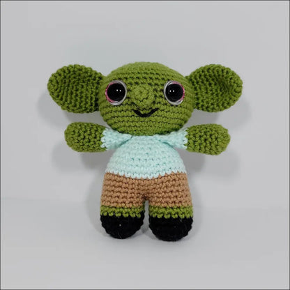 Cute crochet doll in green shirt and brown pants from Goblins Fun Pals with calculated shipping