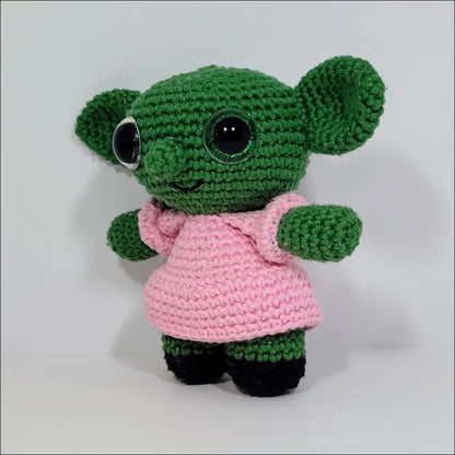 Cute green and pink Goblin plush with a black eye, perfect for checkout with calculated shipping