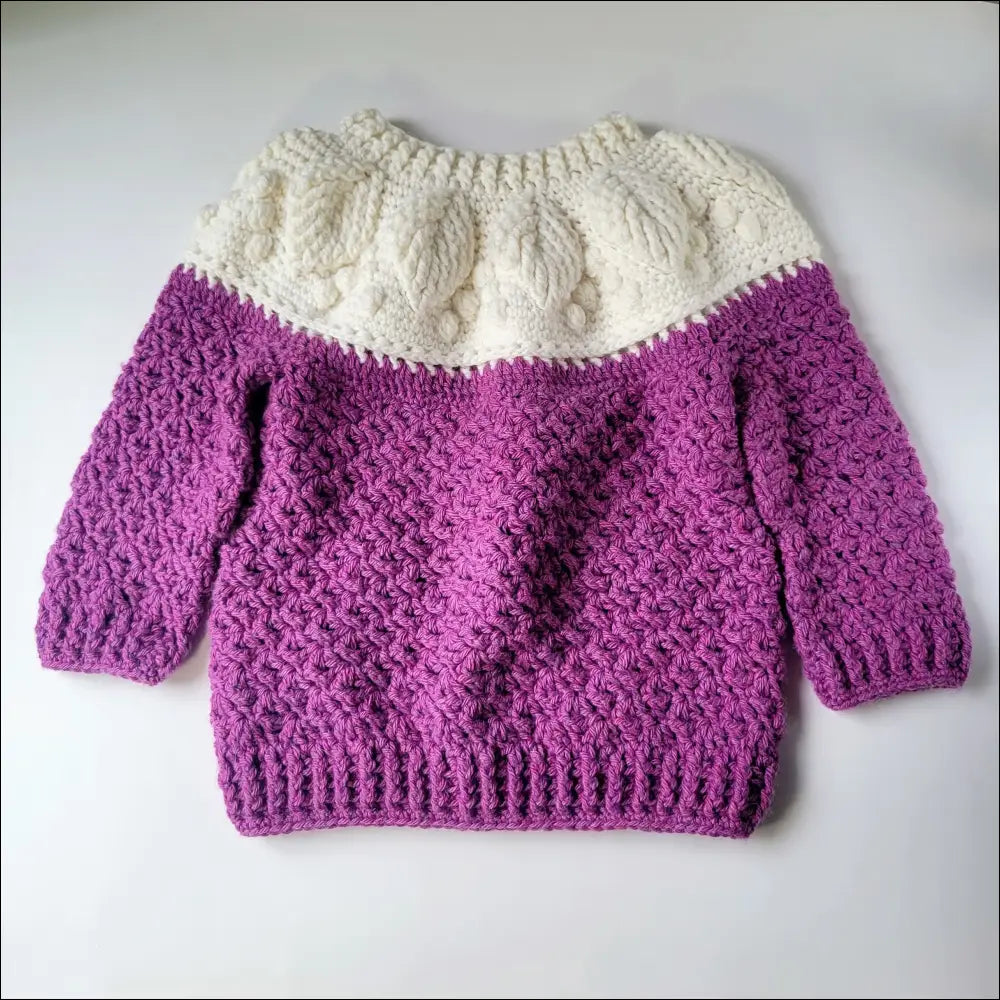 Hand-knitted Harvest Sweater for Toddlers with cozy purple body and cream yoke