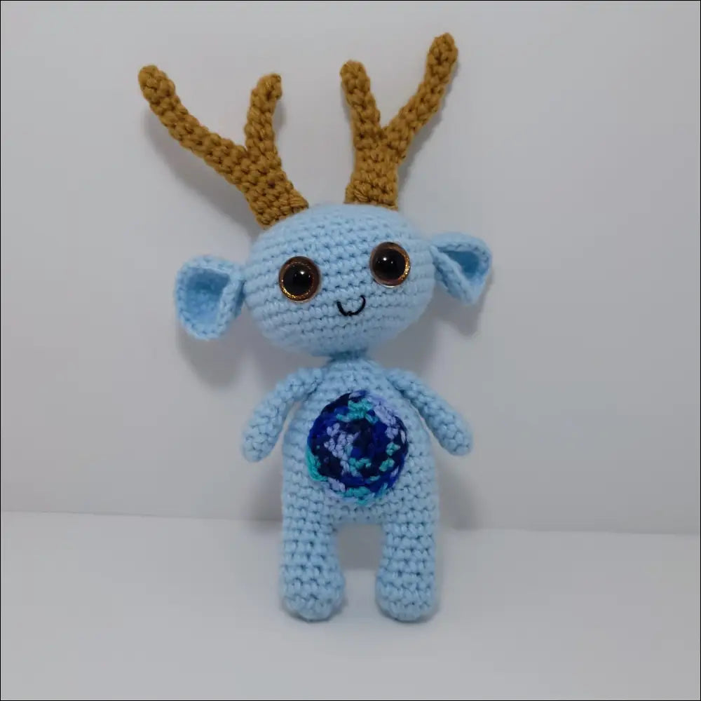 Crochet doll with blue and brown reindeer head from Impkins Enchanted Forest collection