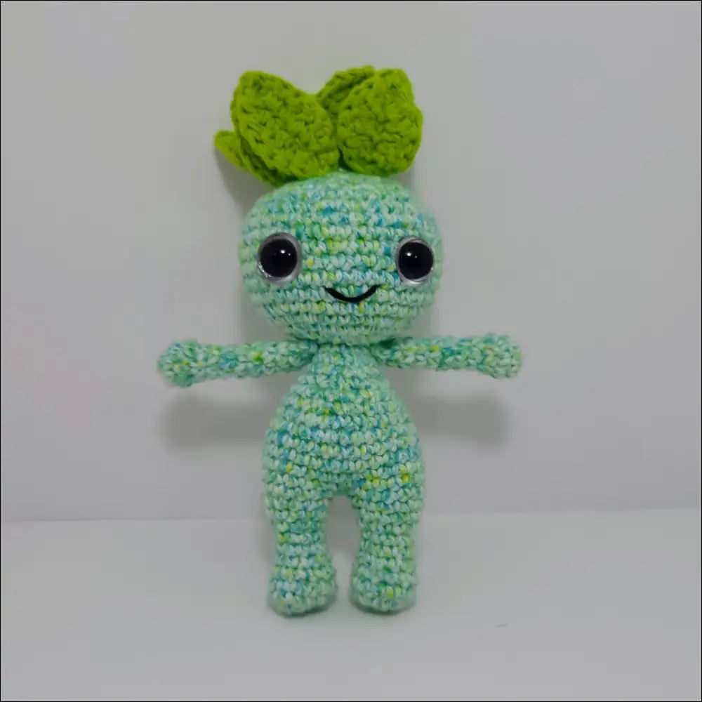 Cute green crochet doll with big eyes and green hair from Impkins Enchanted Forest collection