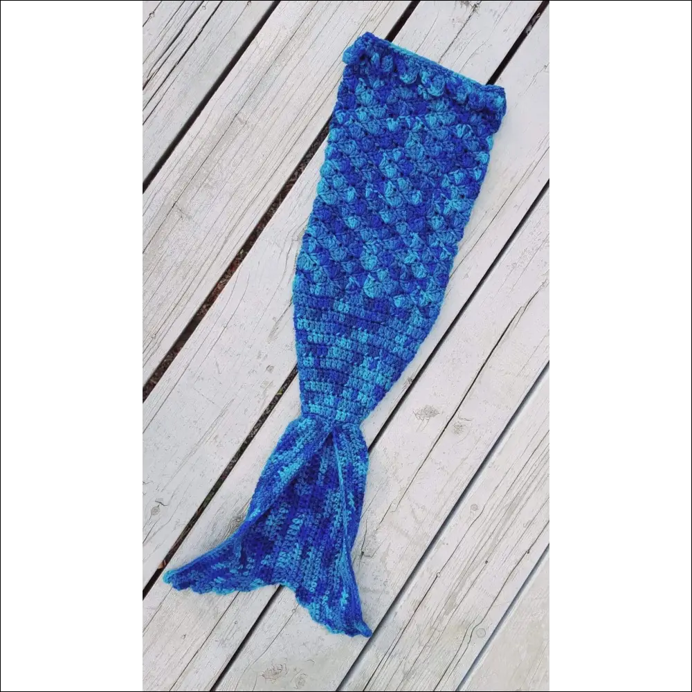 Cozy Blue Mermaid Tail Blanket for Kids in shades of blue, perfect for snuggling!