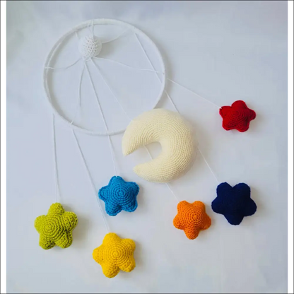 Colorful crocheted mobile moon and stars perfect for your child’s dreamy space