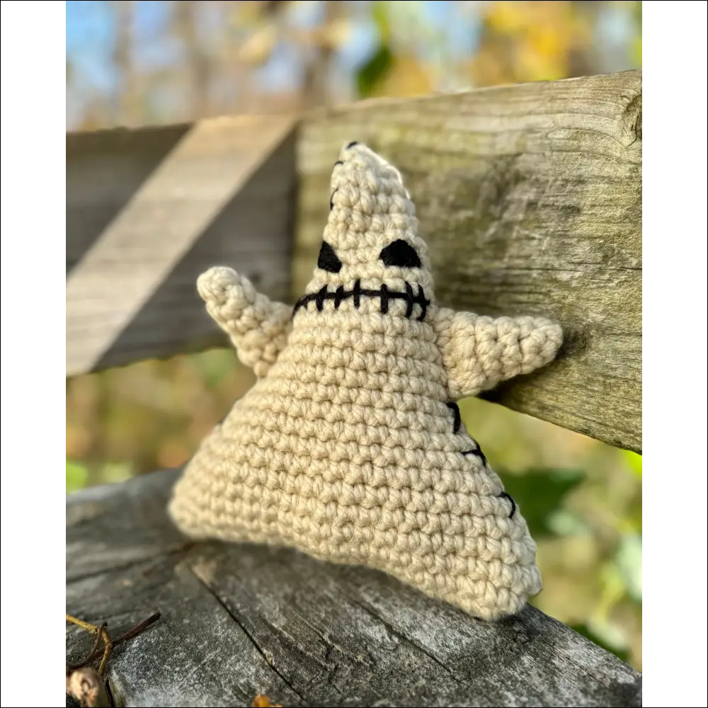 Crocheted Spooky Oogie Boogie Plush with ghostly shape and cute face for Halloween fun