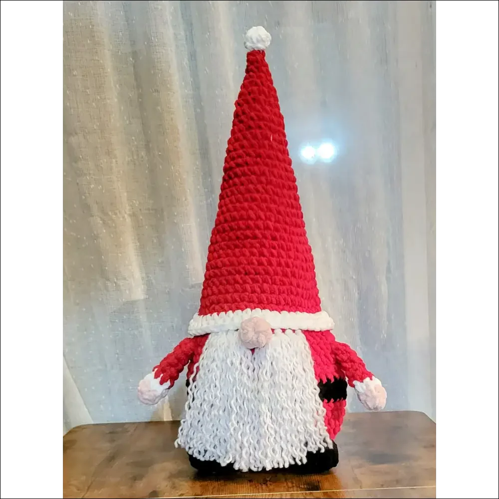 Knitted Santa Gnome with red hat and white beard for festive holiday cheer decor