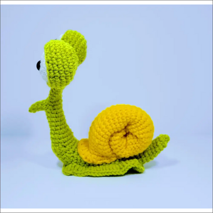 Cute crochet snail toy with a yellow shell in Green Yellow and Grey Pink colors