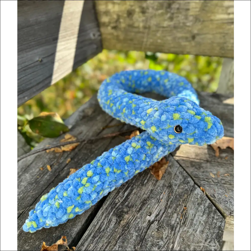 Bright blue and yellow plush snake with loops, perfect for kids and fun times