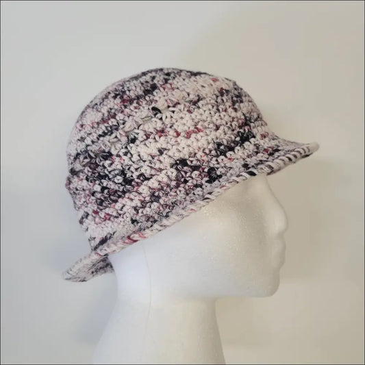 Knitted summer fun bucket hat with speckled pattern and short brim for stylish crocheters