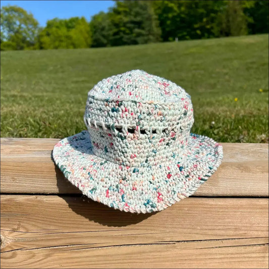 Crocheted sun hat in pastel speckles, perfect for Summer Fun Bucket Hats in Cream Peach Teal