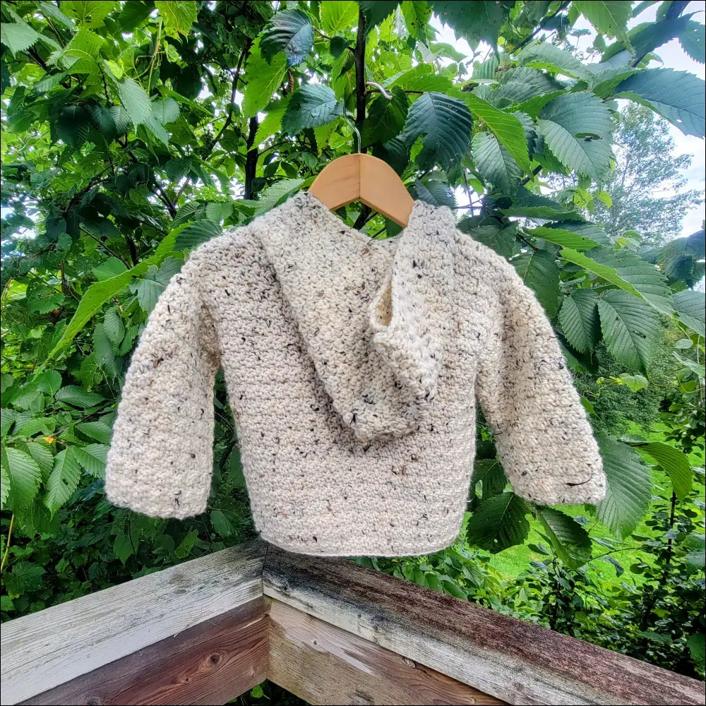 Beige knitted sweater with a hood and wooden buttons, perfect cozy tweed sweater for toddlers