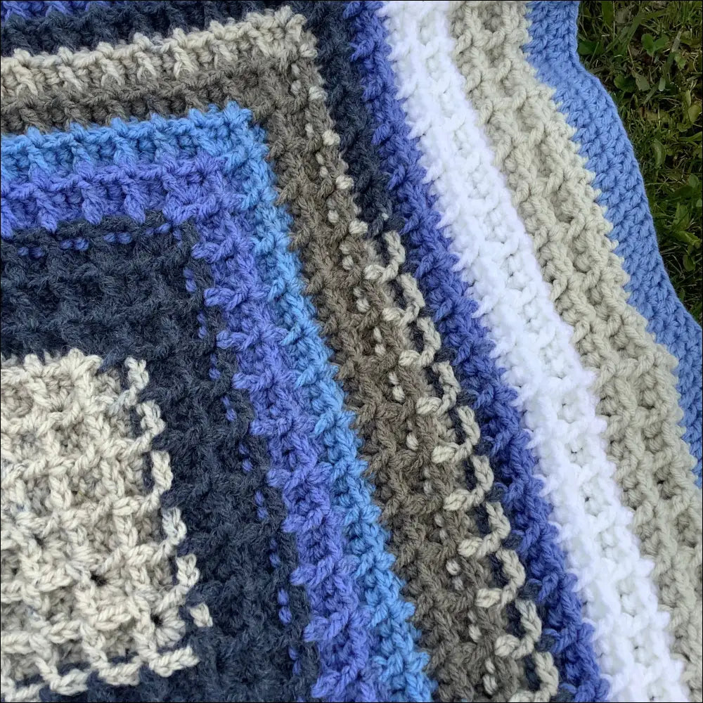 Cozy Waffle Baby Blanket with blue, gray, and white stripes for playful moments