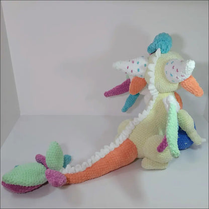 Colorful crochet winged dragon plush perfect for magical adventures and imaginative play