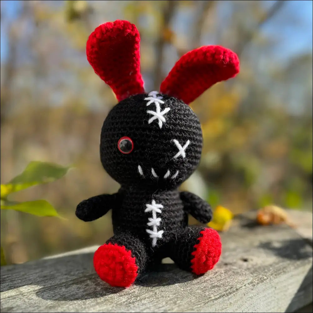 Cuddly and Creepy Zombie Bunny Plush Toy with black and red crochet details