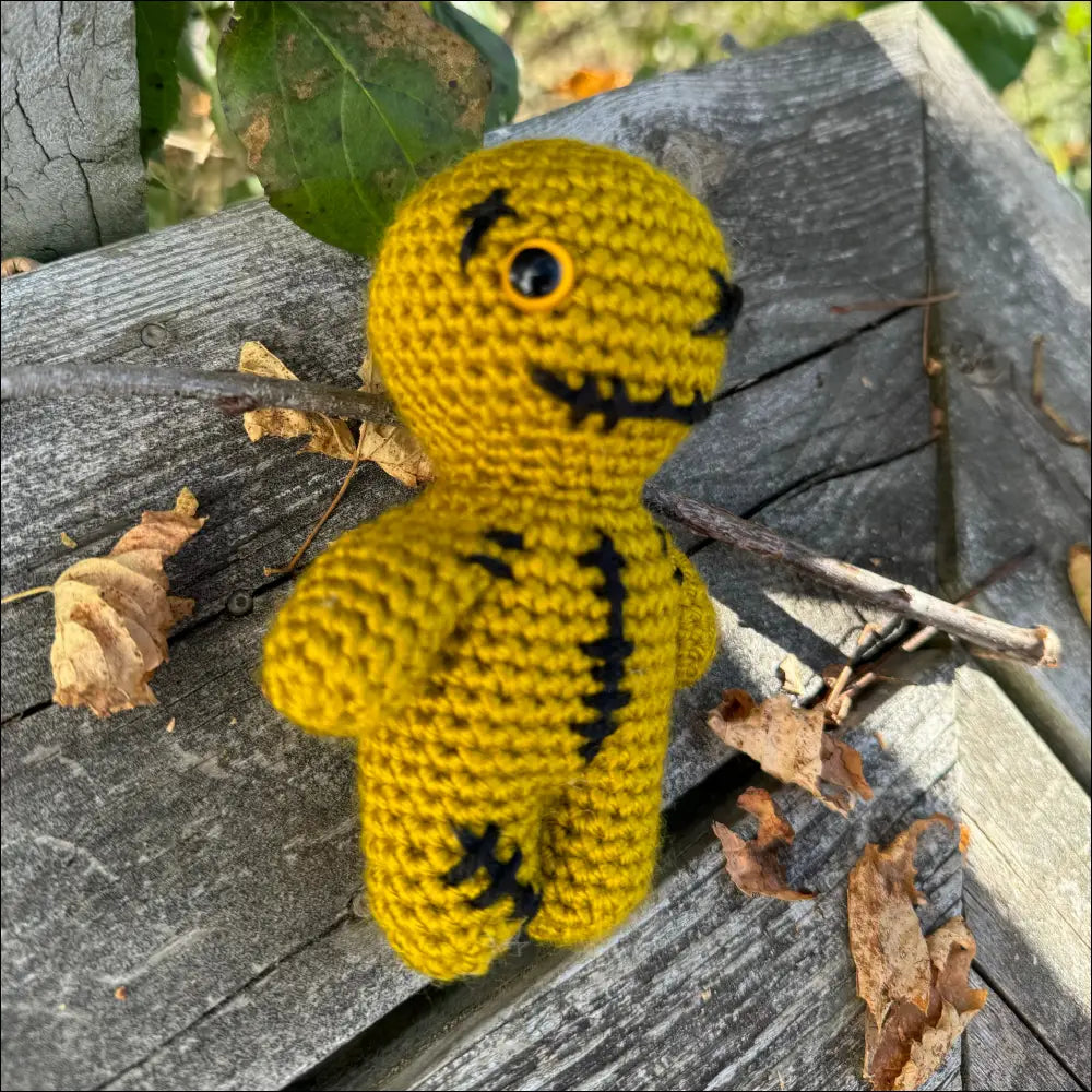 Cute Zombie Plush Toy featuring a cheerful yellow crocheted figure with a simple design